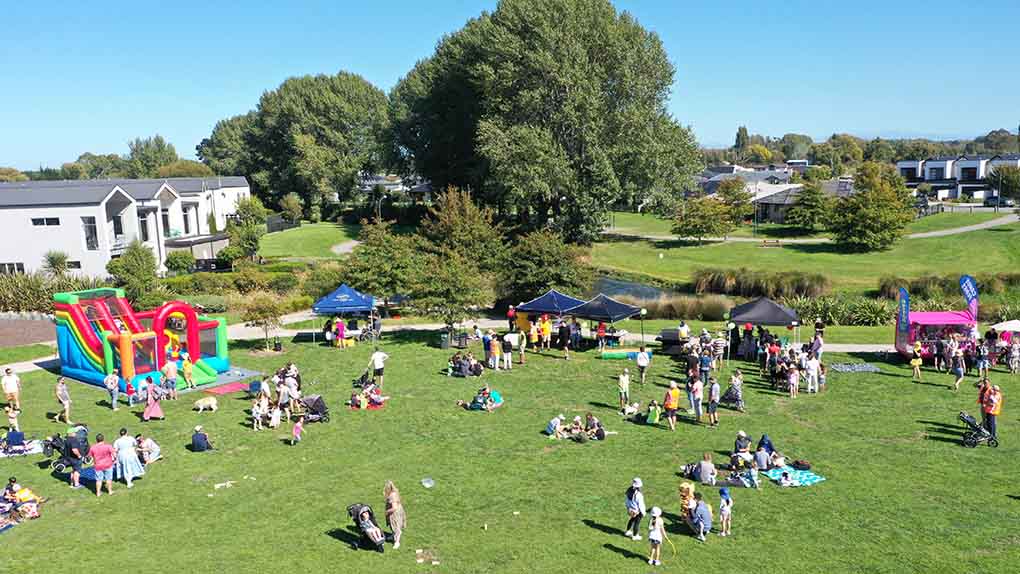 drone of bouncy castle and tents setup in Silverstream green space