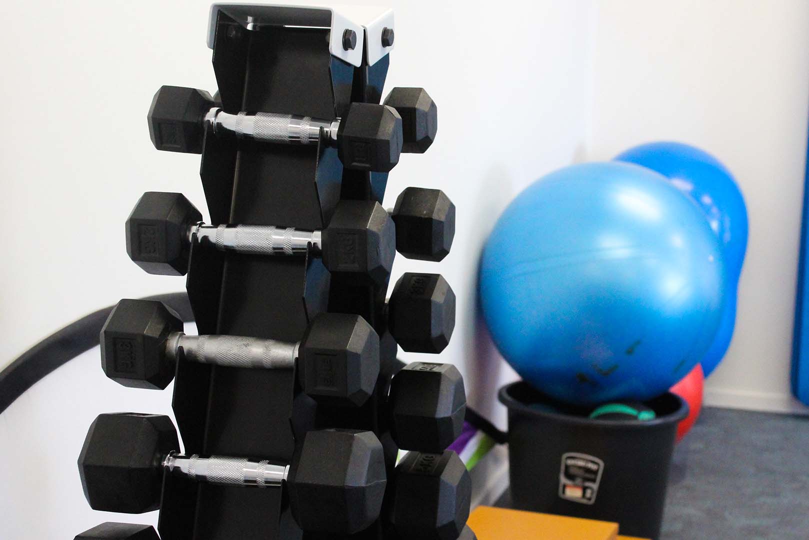 A dumbbell rack at total health physio & podiatry